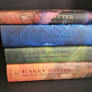 Harry Potter Hardcover Books, #1, 5, 6, 7.